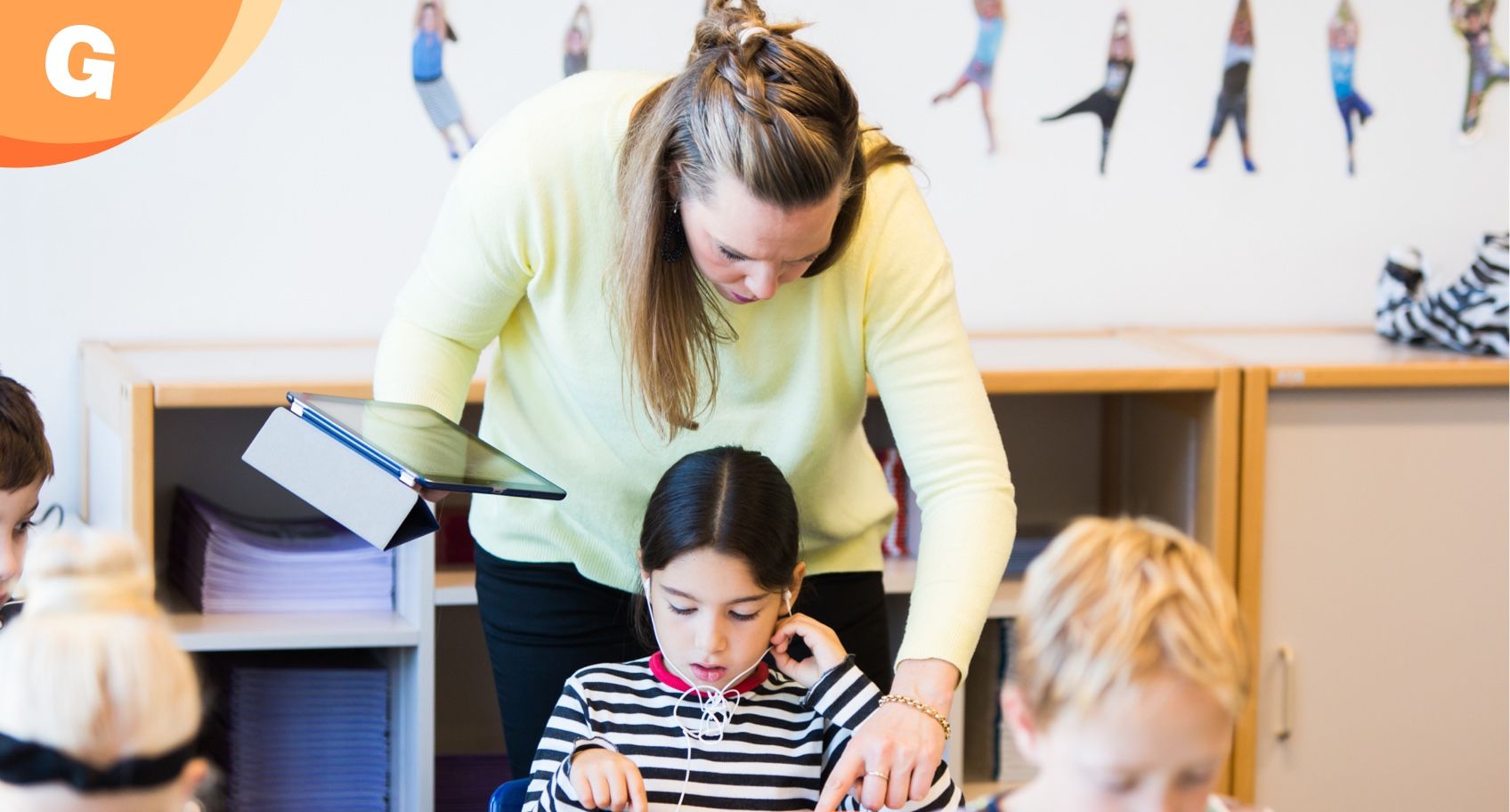 teacher helps student 